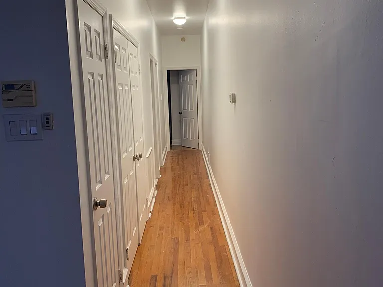 Hallway to laundry, bathroom and bedrooms