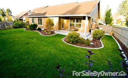 Fenced Back Yard
						:
						Both the front and back yard contain a myriad of trees and shrubs