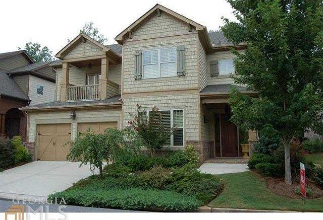 Exterior, Upstairs bedroom has private balcony.