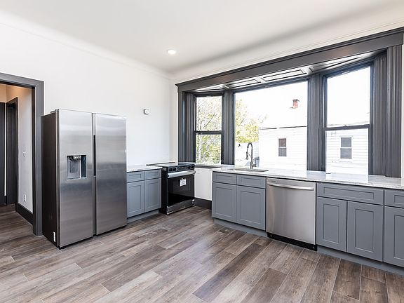 Spacious kitchen with fabulous bay window. Fridge has ice/water in door, garbage disposal.