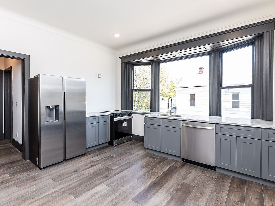 Spacious kitchen with fabulous bay window. Fridge has ice/water in door, garbage disposal.
