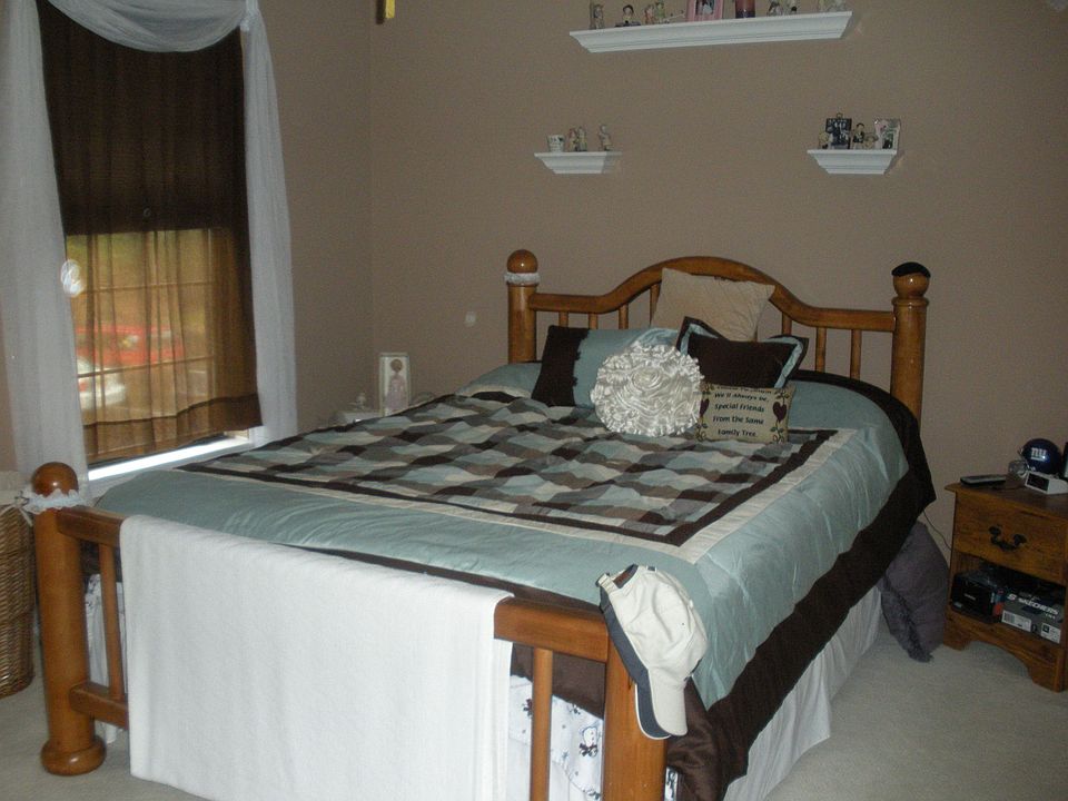 master bedroom with walk-in closet