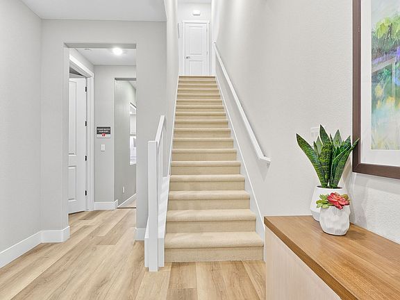 Residence 1 Entry and Stairs to Upstairs