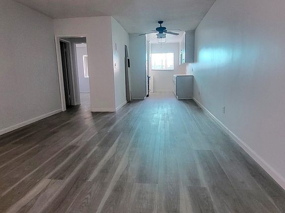 Living room and kitchen. Bathroom and bedroom to the left.