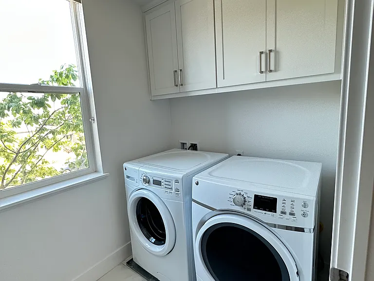Second floor - Washer/dryer along with cabinets