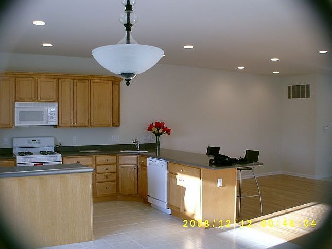 Kraftmaid Cabinets, Corian Countertops