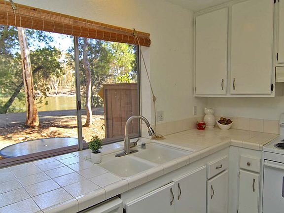 Kitchen looks out over water