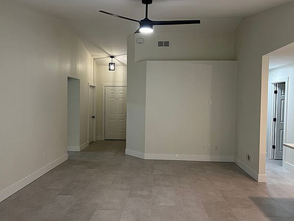 Welcoming entryway with new lighting and fan with multiple lighting and fan features