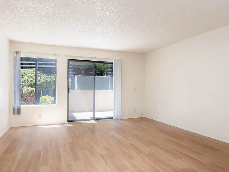 Bedroom with Balcony and Hard Surface Flooring