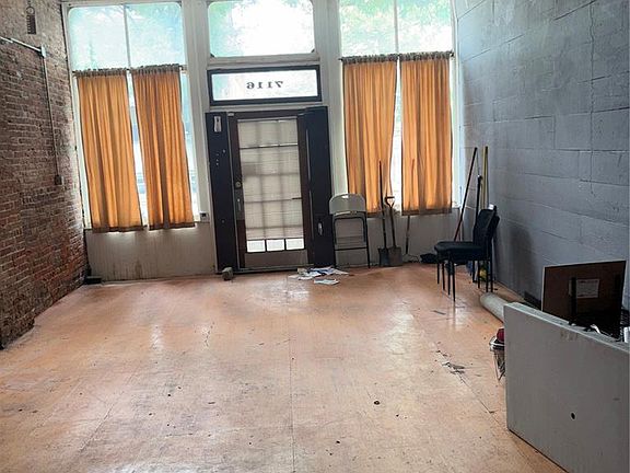 4th image of 7116 S Broadway