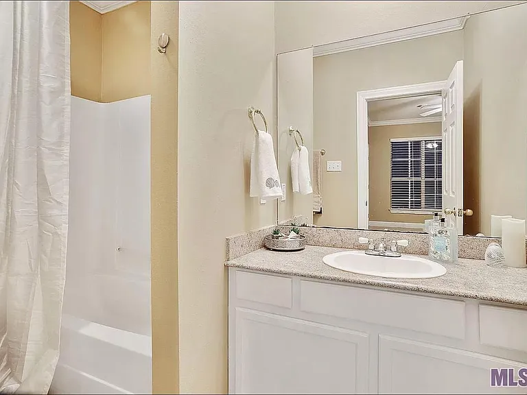 Master bathroom. Very clean with great drawers and cabinets with storage.
