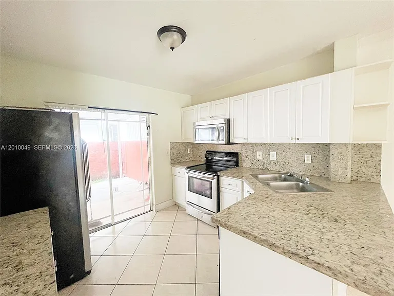 11051 W Okeechobee Rd #101 — Photo 10