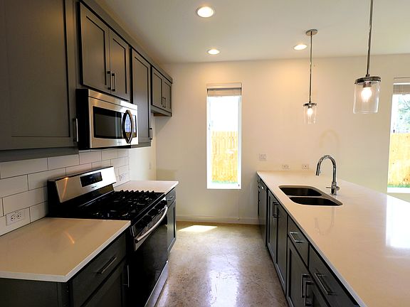 Kitchen with stainless steel appliances