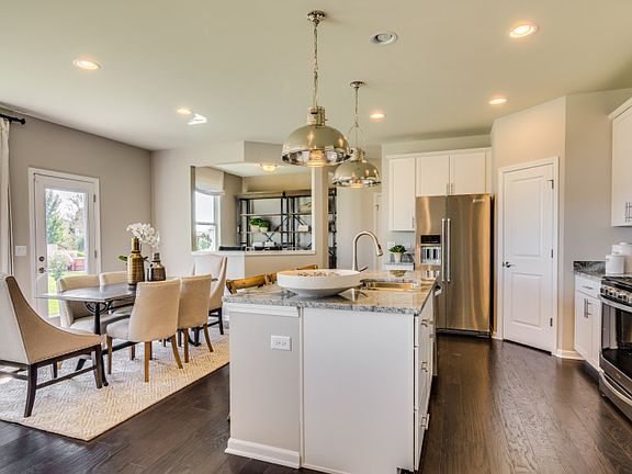 Kitchen with Large Island and Recessed Can Lighting