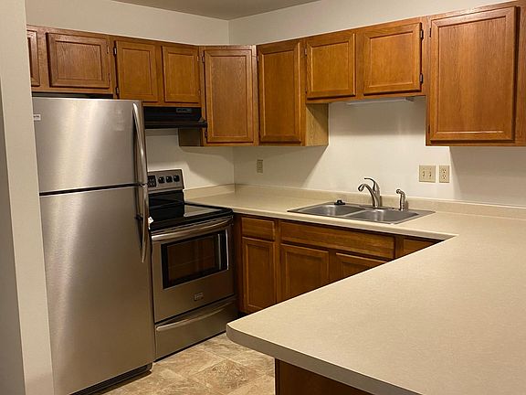 Stainless steel appliances, garbage disposal and new flooring.
