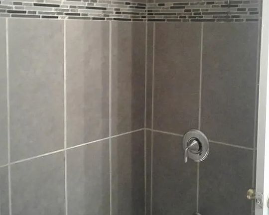 first floor tiled bathroom surround