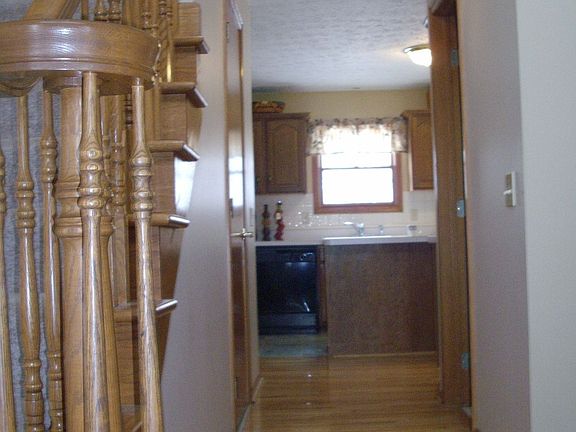 standing at front door