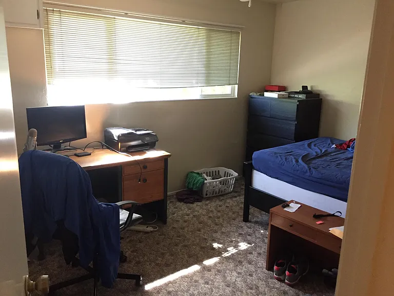 A view of the smaller bedroom.