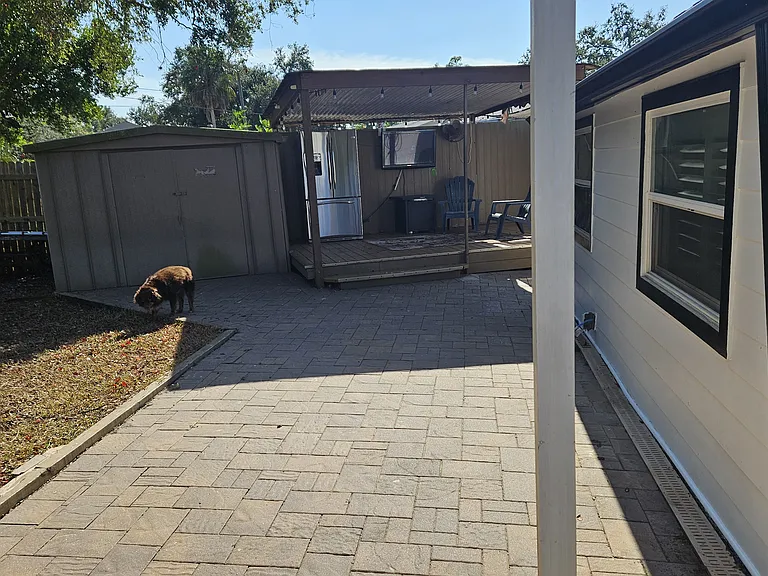 Dog doesn't come wit hthe rental (nor does the motorcycle)
outdoor entertaining area with outdoor fridge and tv