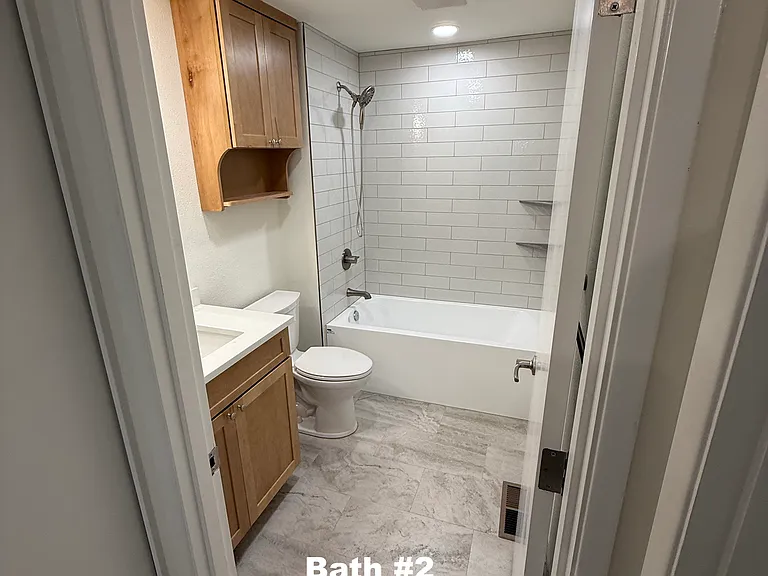 Full bathroom features beautiful tile work and auto whisper fan to help keep out any unwanted moisture or bathroom odors.