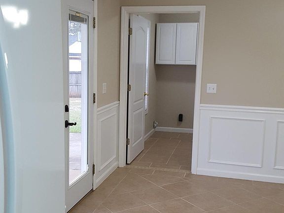 View from Kitchen Sink into Laundry Room