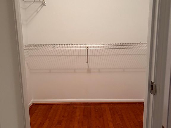 walk-in closet in primary bedroom