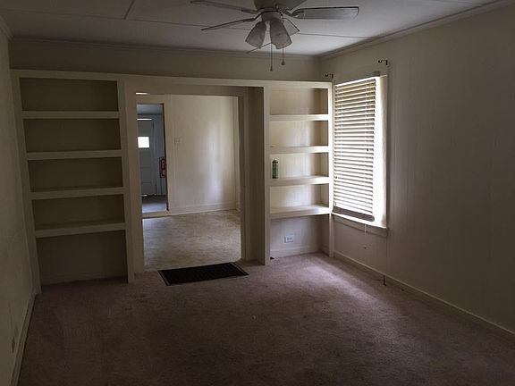 Living room with built in shelves
