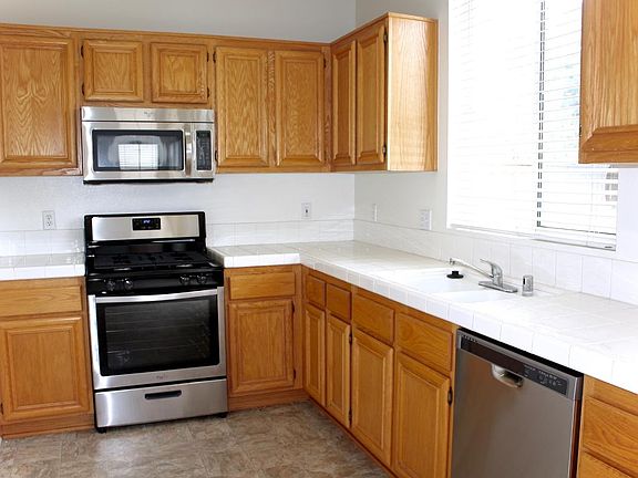 Kitchen overlooks the backyard