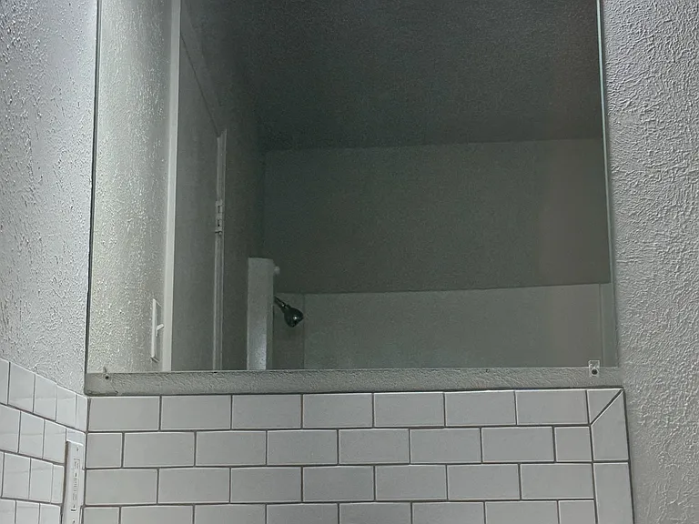 Fully-renovated bathrooms are easy to keep clean.