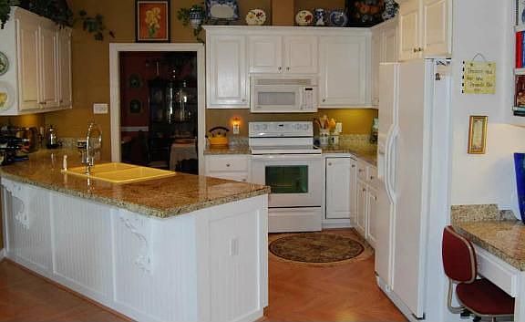 Kitchen with Bar and Computer Desk