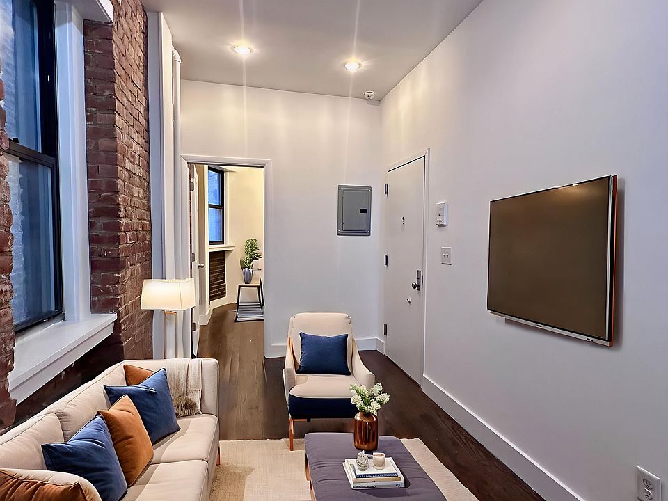 1st image of 409 W 48th St APT 1FW