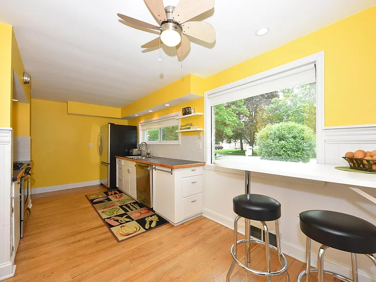 Hardwood Floors and Lots of Windows. Breakfast Bar area.