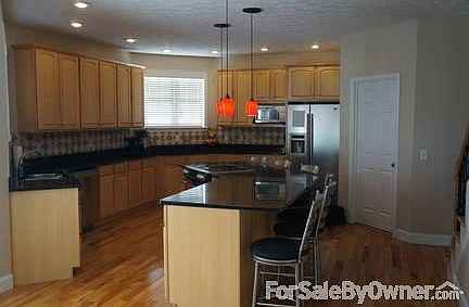 Kitchen
						:
						Granite countertops, stainless appliances