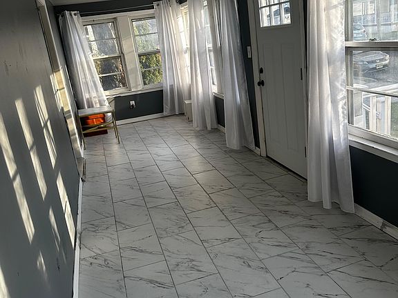 Inclosed front porch