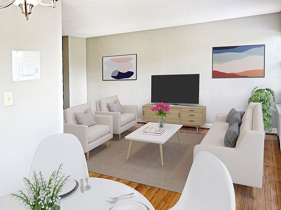 Apartment living and dining area (virtually staged)