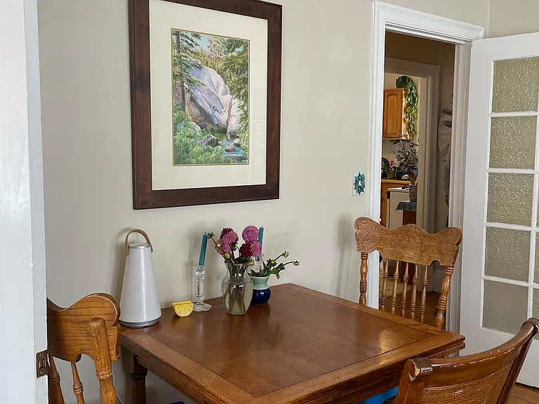 Living room as furnished by previous tenants