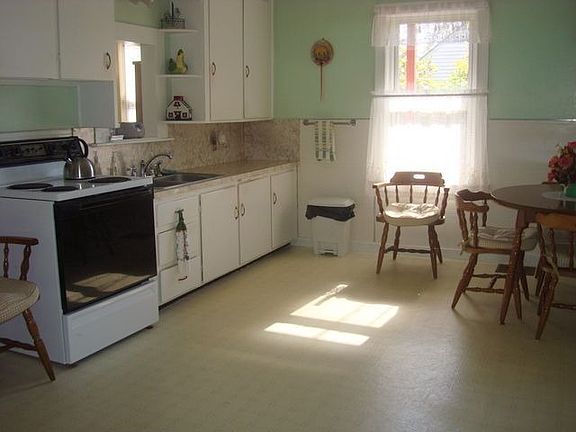 Large kitchen with built in cabinetry.
