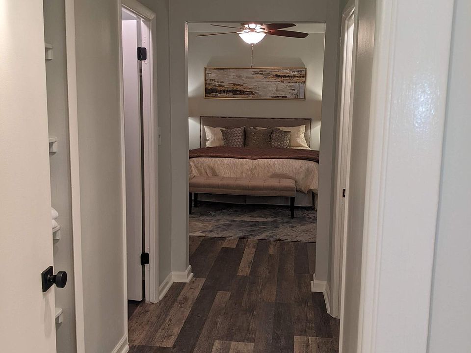 His and Her Walk-in closets. One on each side of the hall. Plus shelves on the left for easy access regularly used items.