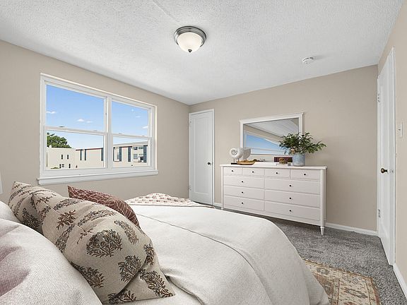 Step into tranquility at Crestwood Townhomes. This beautifully designed bedroom features ample natural light, stylish decor, and a serene atmosphere perfect for relaxation. Don't miss out on making this space your ownschedule a tour today!