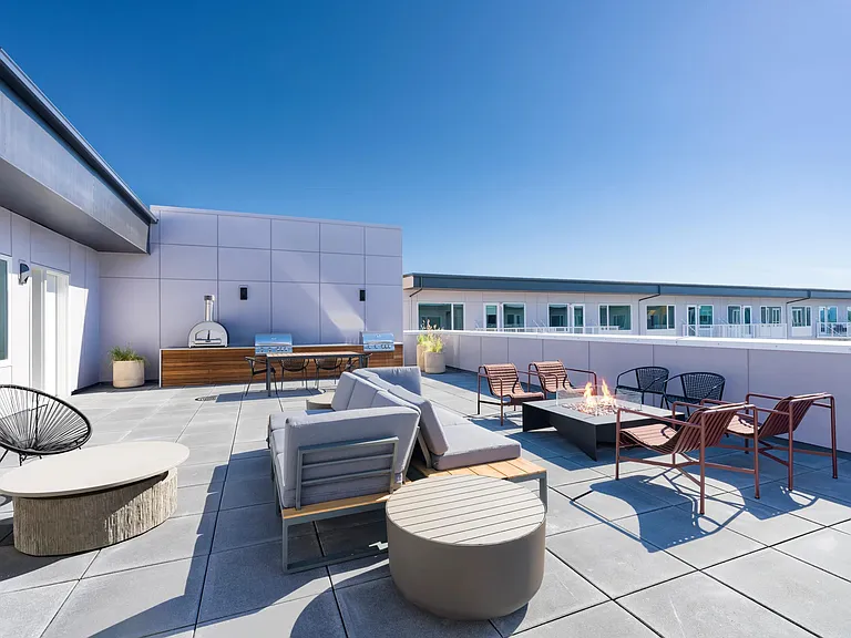 Fire up the grill and kick back_our 5th-floor deck is your go-to spot for great views and good vibes.