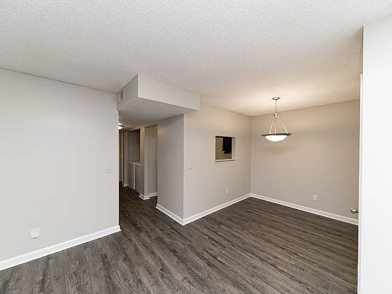 Dining area with hardwood-style flooring