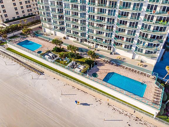 This is a view of the Beach Side..2 pools , 2 hot tubs and lounge chairs for you to work on your tan.