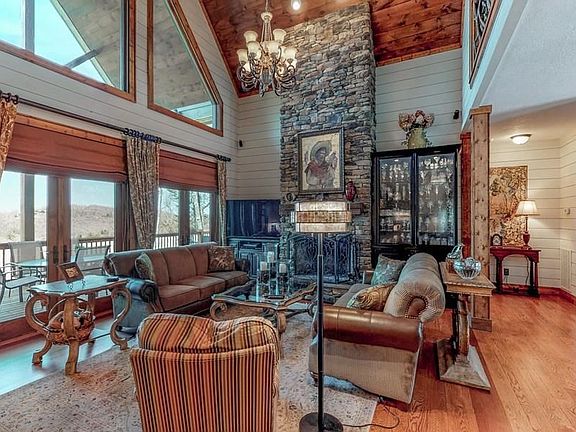 Floor to ceiling fireplace and built in cabinetry