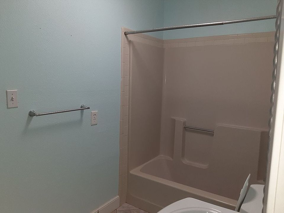 bathroom attached to bedroom