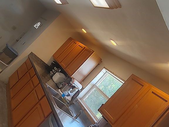 One more cabinet to go back up