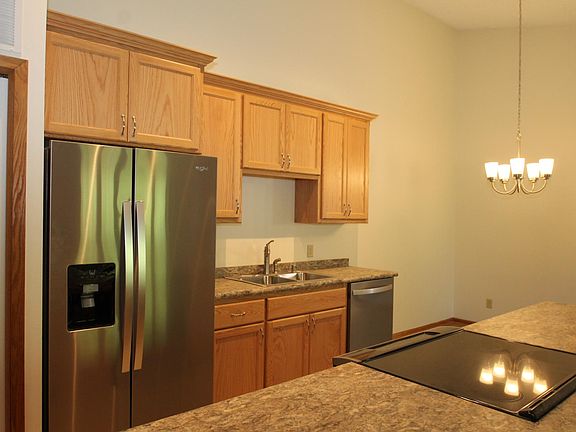 All new stainless steel appliances. Microwave is located to the right of the oven.