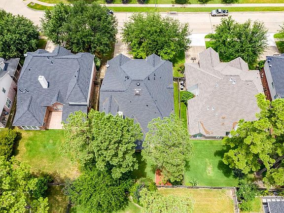 An aerial view of the property shows these grown trees and how they provide great shade!