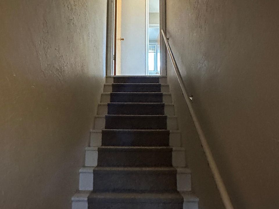 Stairs from front door to main floor.