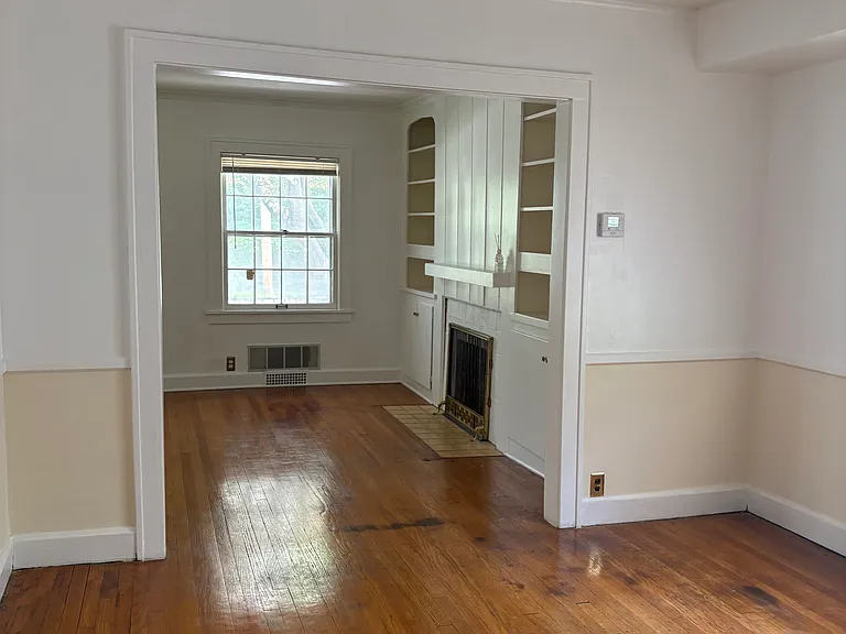 Dining room (could be family room) looking into the living room.