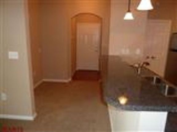 center island breakfast bar-wood entry floor